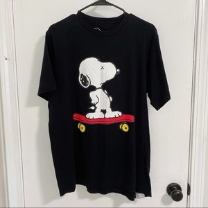 Like new KAWS x Uniqlo x Peanuts Snoopy Skateboarding Tee